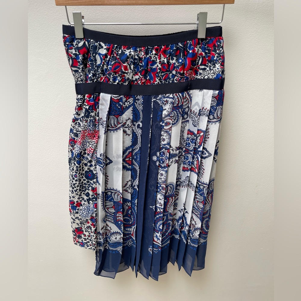 Pleated asymm Sacai skirt with slip underneath